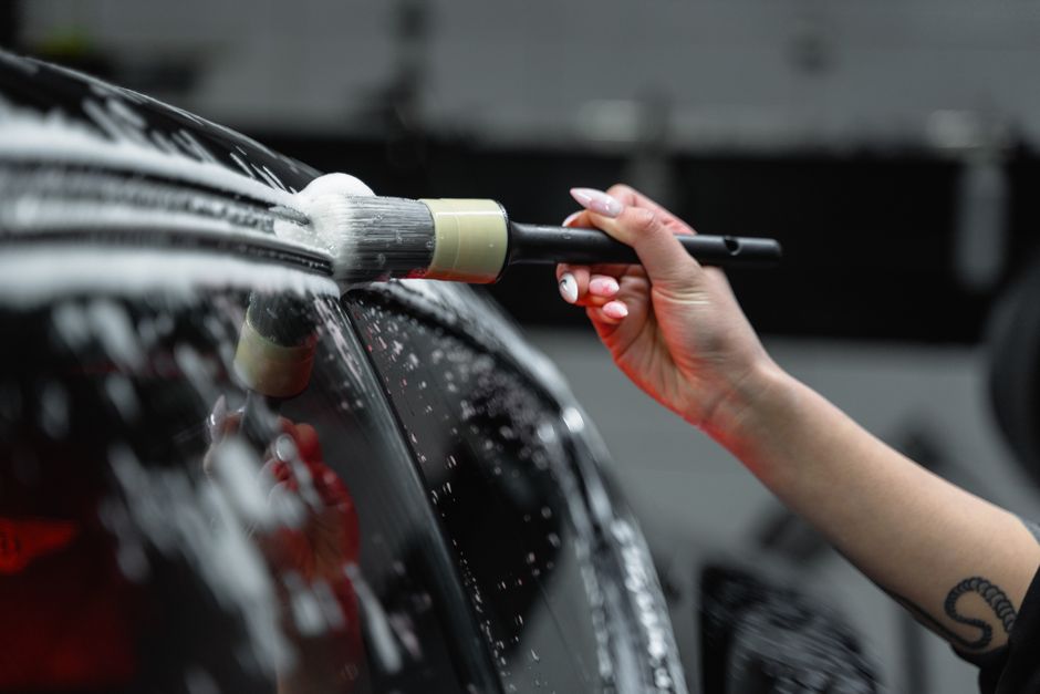 A car interior being deep cleaned during interior detailing